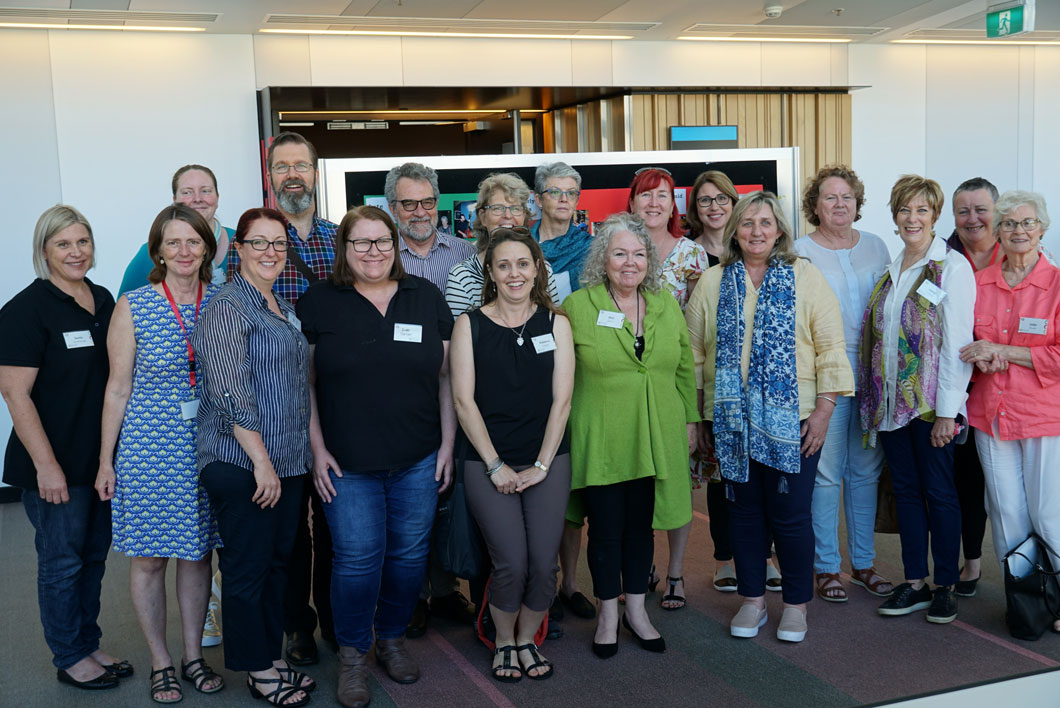 A large group of parents standing together at a cru conference